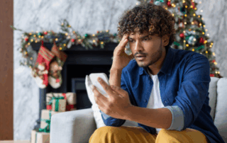 Man Looking at Phone Worried